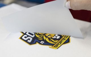 mbw tranferdruckmaschine v 320x202 - mbw: Neue Transferdruckmaschine