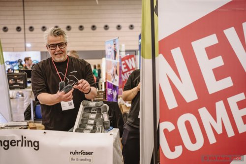 21 345 A7203935 DCE - HAPTICA live &rsquo;26: Merch gewinnt